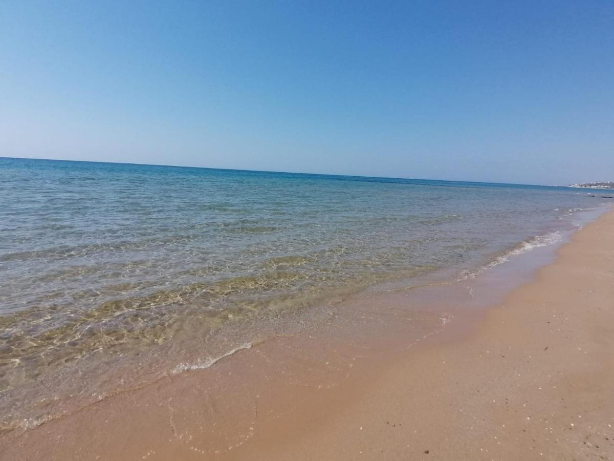 Villa La Perla Bianca Porto Palo Esterno foto