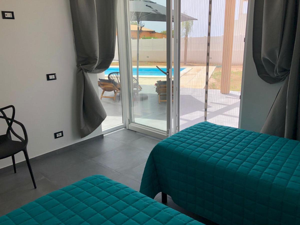 Villa La Perla Bianca Porto Palo Esterno foto